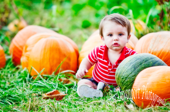 Aiden Almost One in the Pumpkin Patch_